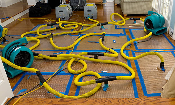 Professional Flood Damage Restoration technician working in Bladensburg, OH